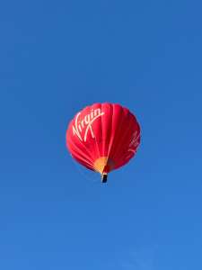 Virgin hot air balloon G-VBAX, a Cameron A-400, seen at Leigh Woods, North Somerset, United Kingdom on 7 August 2026. Photograph by R0nN1e