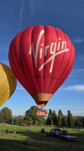 Virgin hot air balloon G-VBAX, a Cameron A-400, seen at Leigh Woods, North Somerset, United Kingdom on 4 October 2026. Photograph by Dave