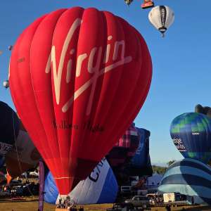 Virgin hot air balloon G-VBBB, a Cameron A-300, seen at Leigh Woods, North Somerset, United Kingdom on 7 August 2026. Photograph by Dave