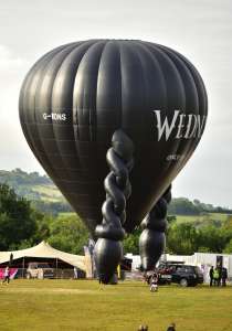 Netflix hot air balloon G-WDNS, a Kubicek Factory S.R.O. BB22Z (Wednesday), seen at Leigh Woods, North Somerset, United Kingdom on 8 August 2025. Photograph by Dave